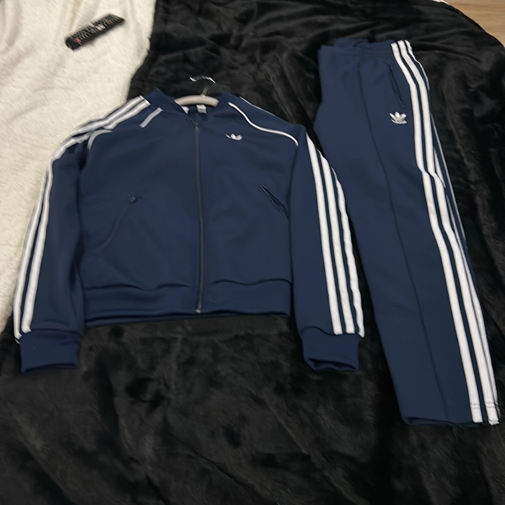 Adidas track suit